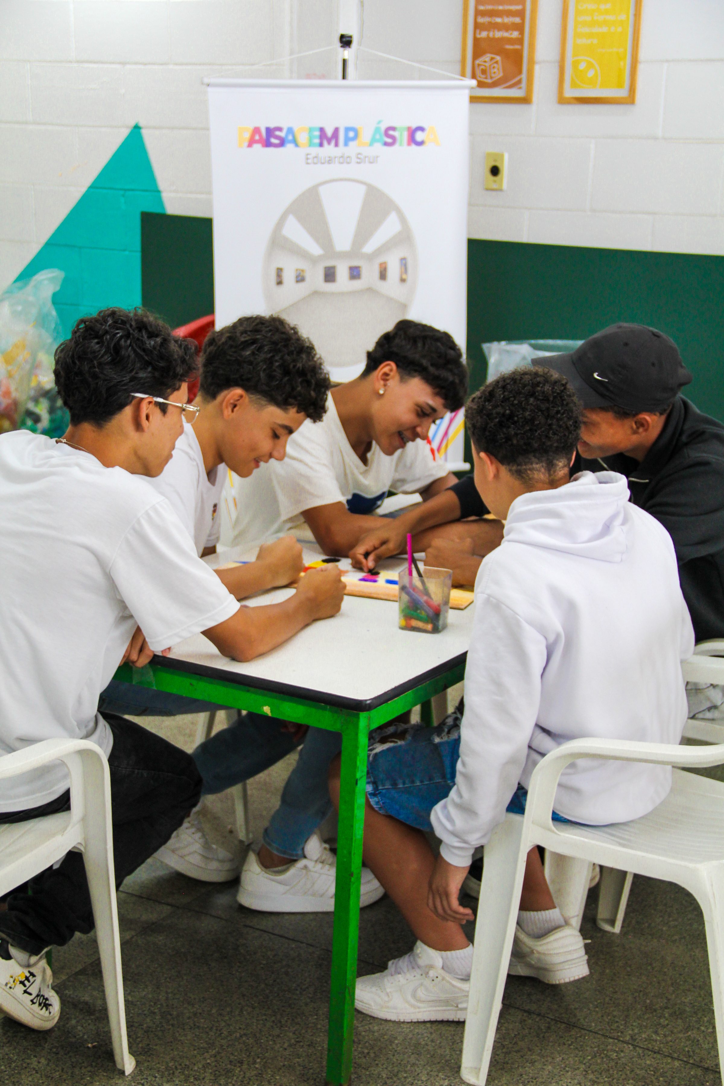 Students working together at a workshop table